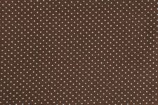 White dots on brown