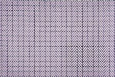 Purple herringbone in dotted blue squares