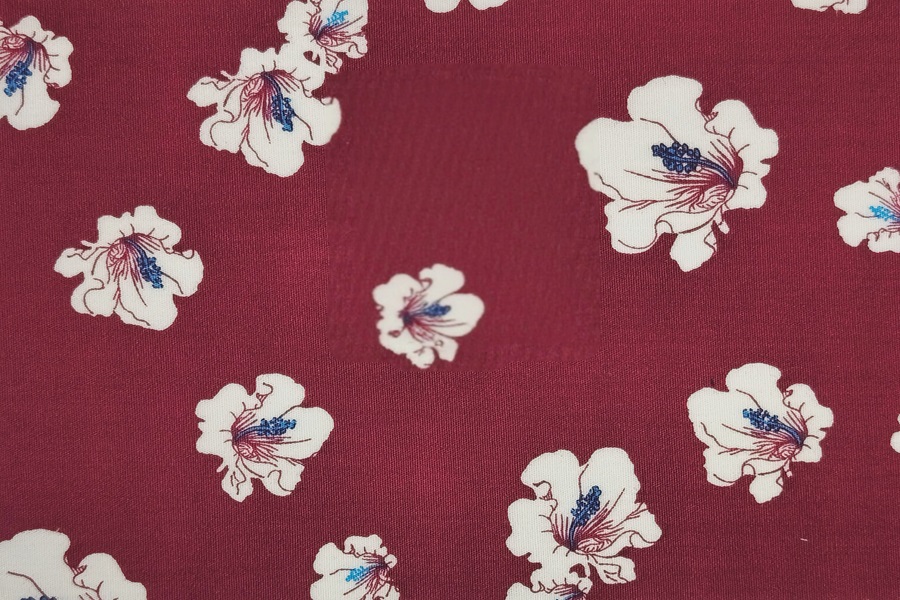 White flowers on burgundy